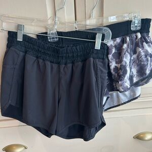 TWO PAIR LULULEMON SHORTS
SIZE 8